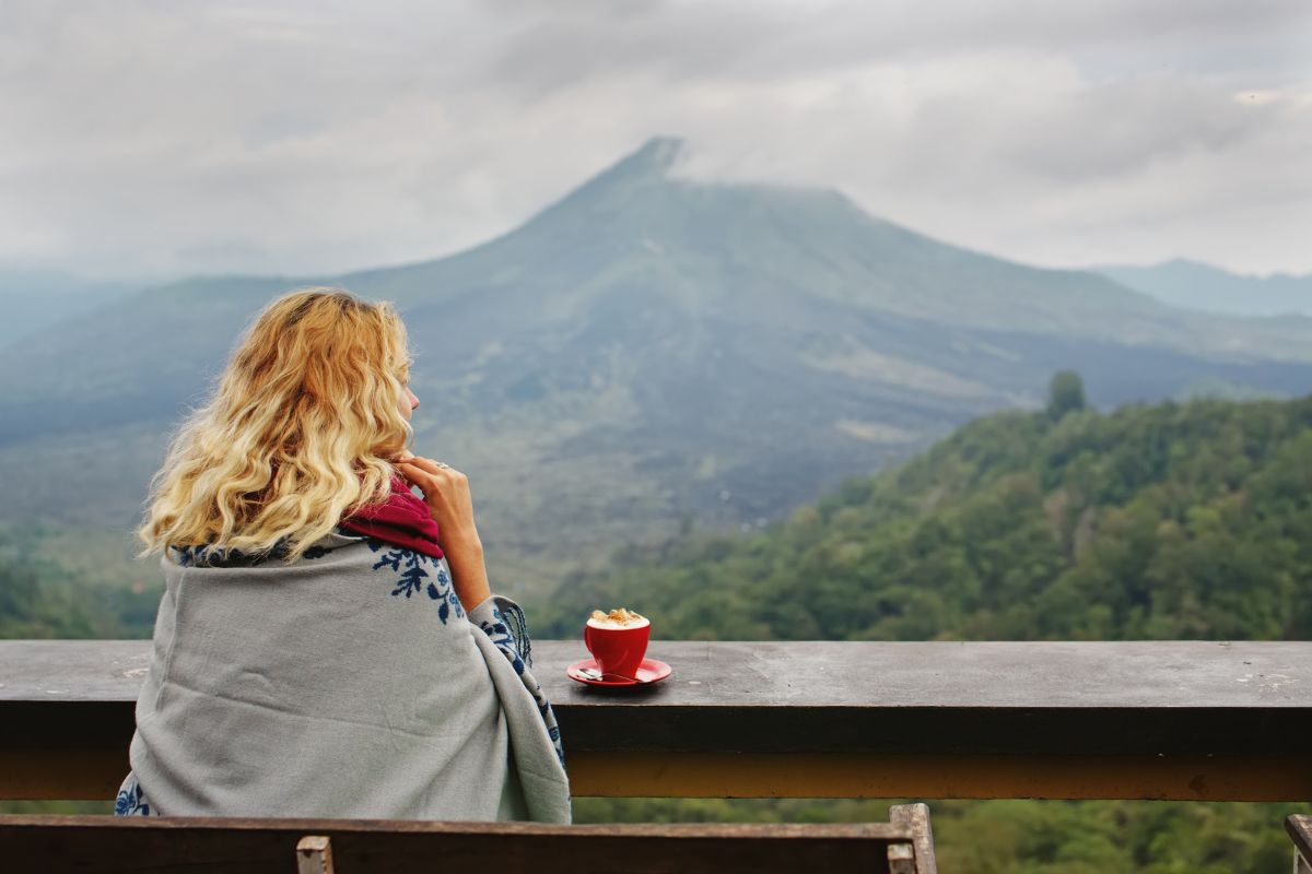 woman in Bali enjoying fresh coffee